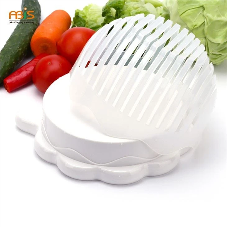 A Sectile Salad Bowl With Fruit Cutting